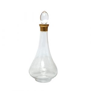 Carafe en verre avec couvercle doré