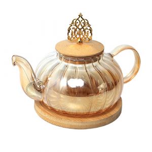 Théière en verre avec dessous en bois