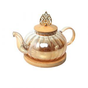 Théière en verre avec dessous en bois